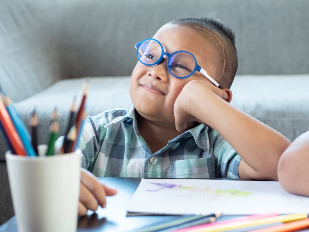 portrait of young smiling, think. boy kid with disabilities brain disorders